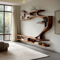 Branching wall TV shelf system in carved wood in an open plan space in daylight