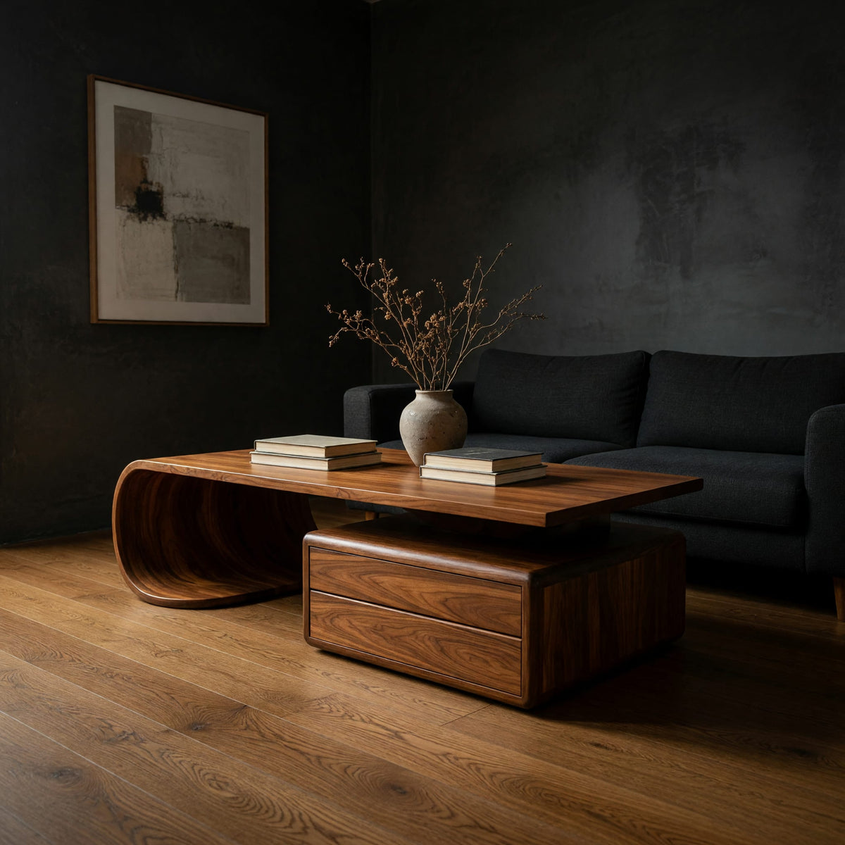 Cantilever coffee table with a two drawer box base in a dark studio against a charcoal wall