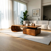Cantilever coffee table with a two drawer box base in a bright modern living room