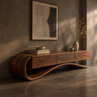 Corner detail of cantilever tv stand with a long wooden body on a scrolled ribbon base beside wood, brass and linen samples
