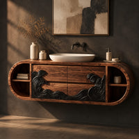 Pill shaped floating bathroom vanity with a black carved wave front, three-quarter view showing the grain