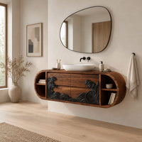 Pill shaped floating bathroom vanity with a black carved wave front in a Scandinavian bathroom with white walls
