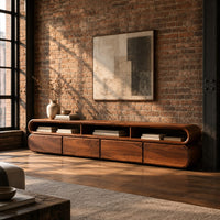 Capsule shaped tv stand with curved ends and open top bays in an industrial loft living room with exposed brick