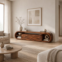 Capsule shaped tv stand with wave carved panels and open end shelves in a Scandinavian living room with white walls