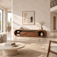 Capsule shaped tv stand with wave carved panels and open end shelves in a bright open plan living room