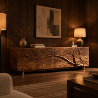Tv stand with a carved branch relief across four front panels in an evening living room with walnut wall paneling