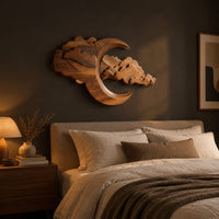 Carved crescent moon wall art with a bank of layered scalloped clouds above a bed in a dusk lit bedroom