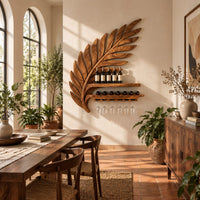 Carved leaf shaped wine rack with a long shelf and a rail for stemware in a bright dining room with arched windows and plants
