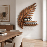 Carved leaf shaped wine rack with a long shelf and a rail for stemware in a Scandinavian dining room with white walls