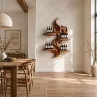 Carved wood flame wine rack with four wide shelves reaching out from the center in a bright open plan dining room