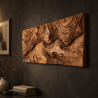 Wide wood relief wall art carved with flowing contour ridges, three-quarter view showing the carved depth