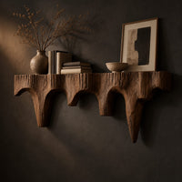 Mantel shelf with tapered drip arches and a rough grooved face, three-quarter view showing the grain