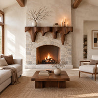 Mantel shelf with tapered drip arches and a rough grooved face in a bright open plan living room