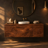 Floating bathroom vanity cabinet with three carved wave front panels in a dark bathroom at golden hour