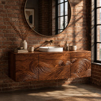 Floating bathroom vanity cabinet with three carved wave front panels in an industrial loft bathroom with exposed brick