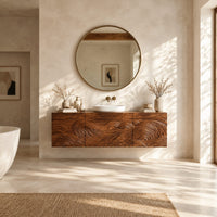 Floating bathroom vanity cabinet with three carved wave front panels in a bright open plan bathroom