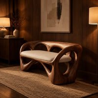 Bench with a looped wooden frame, cutout back and cream cushion in an evening entryway with walnut wall paneling