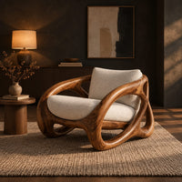 Chunky looped wood frame chair with oval openings and a cream seat in a dark living room at golden hour