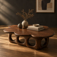Cloud shaped coffee table on a base of round arches, three-quarter view showing the grain
