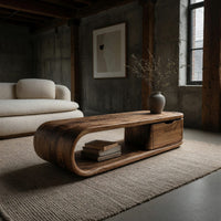 Long loop coffee table with a side drawer box in a concrete and timber loft