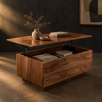 Boxy wooden coffee table with a lift up top on dark hinged arms, three-quarter view showing the grain