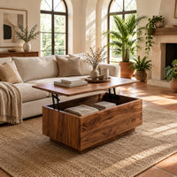 Boxy wooden coffee table with a lift up top on dark hinged arms in a bright living room with arched windows and plants
