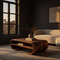Coffee table with rolled ends and a double open shelf in a living room at golden hour
