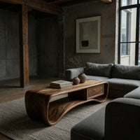 Compact loop coffee table with a small drawer in a concrete and timber loft