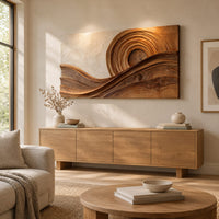 Rectangular wood wall art with concentric rings above flowing carved wave bands above a light oak sideboard in daylight