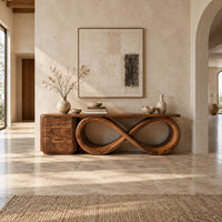 Console table on a figure eight loop base beside a three drawer block in a bright open plan entryway