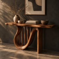 Console table with a looping curved base and tapered spindles under the top, three-quarter view showing the grain