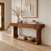 Console table with a thick top and an open loop frame base in a Scandinavian entryway with white walls