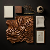 Detail of free form carved contour wall sculpture beside wood, brass and linen samples