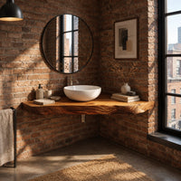 Corner floating live edge wood slab vanity with open space below in an industrial loft bathroom with exposed brick