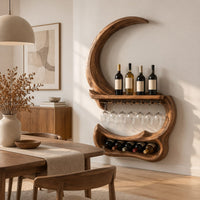 Crescent moon wine rack with a carved peak, a shelf and a glass rail in a Scandinavian dining room with white walls