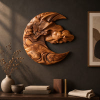 Detail of crescent shaped wooden wall art carved with layered clouds and waves beside wood, brass and linen samples
