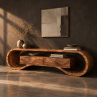 Tv stand with a looping curved frame and a wave carved center box, three-quarter view showing the grain