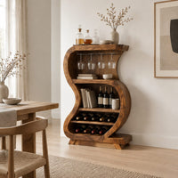 S shaped open bar cabinet with a glass rail and tiered bottle shelves in a Scandinavian dining room with white walls