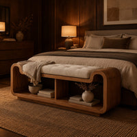 Curved bench with a tufted seat cushion and two open cubbies below in an evening bedroom with walnut wall paneling