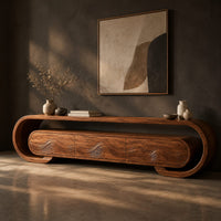 Low tv stand with a looped frame and three wave carved fronts, three-quarter view showing the grain