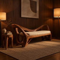 Bench with a cream seat cushion and a sculpted frame full of open cutouts in an evening entryway with walnut wall paneling