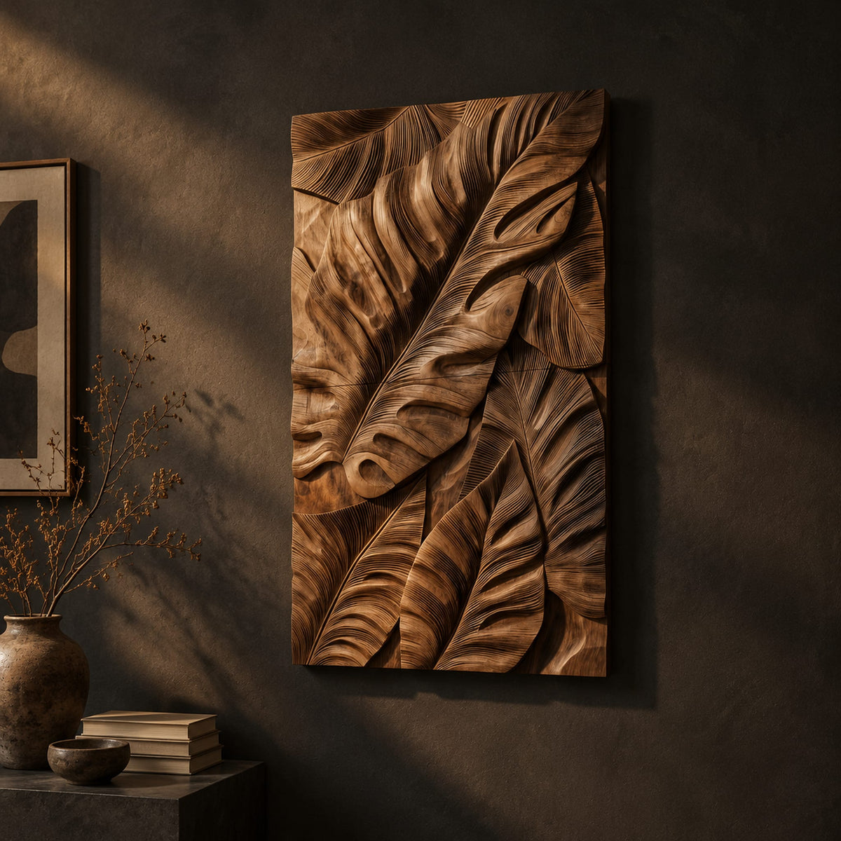 Tall wooden wall art panel with overlapping carved leaf relief on a dark charcoal plaster wall