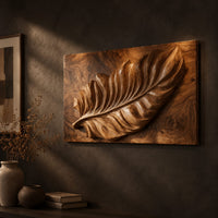 Rectangle wooden wall panel with a deep relief leaf carved across swirling grain on a dark charcoal plaster wall