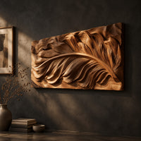 Wide carved wood relief panel of a sweeping feather with flowing layered barbs on a dark charcoal plaster wall