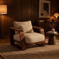 Deep seat lounge chair with thick looped wood arms and a lumbar pillow in an evening living room with walnut wall paneling