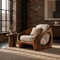 Thick shell wooden chair with wide side openings and cream cushions in an industrial loft living room with exposed brick