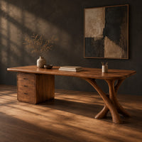 Wide desk with a forked limb leg and a three drawer pedestal, three-quarter view showing the grain