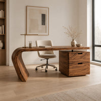 Desk with a single swept side leg and a two drawer cabinet in a Scandinavian home office with white walls