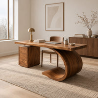Desk with a sweeping scroll base and a three drawer pedestal in a Scandinavian home office with white walls