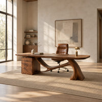 Wooden desk with a swooping single leg and a stacked drawer block in a bright open plan home office
